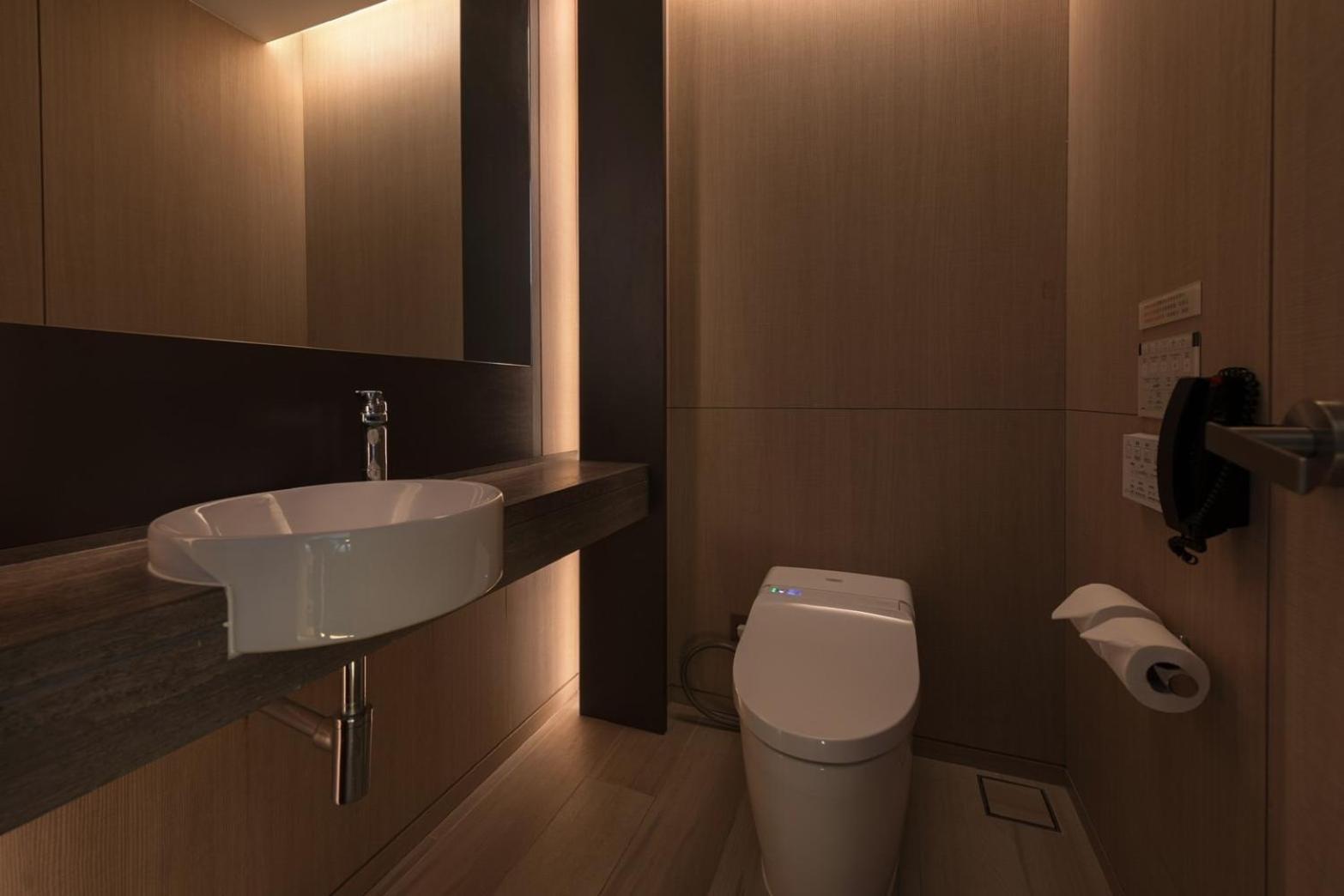 Mu Jiaoxi Hotel מראה חיצוני תמונה A modern bathroom