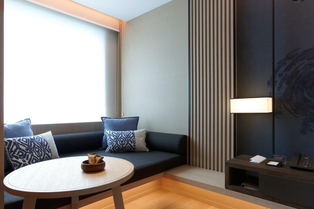 Mu Jiaoxi Hotel מראה חיצוני תמונה A room at the hotel