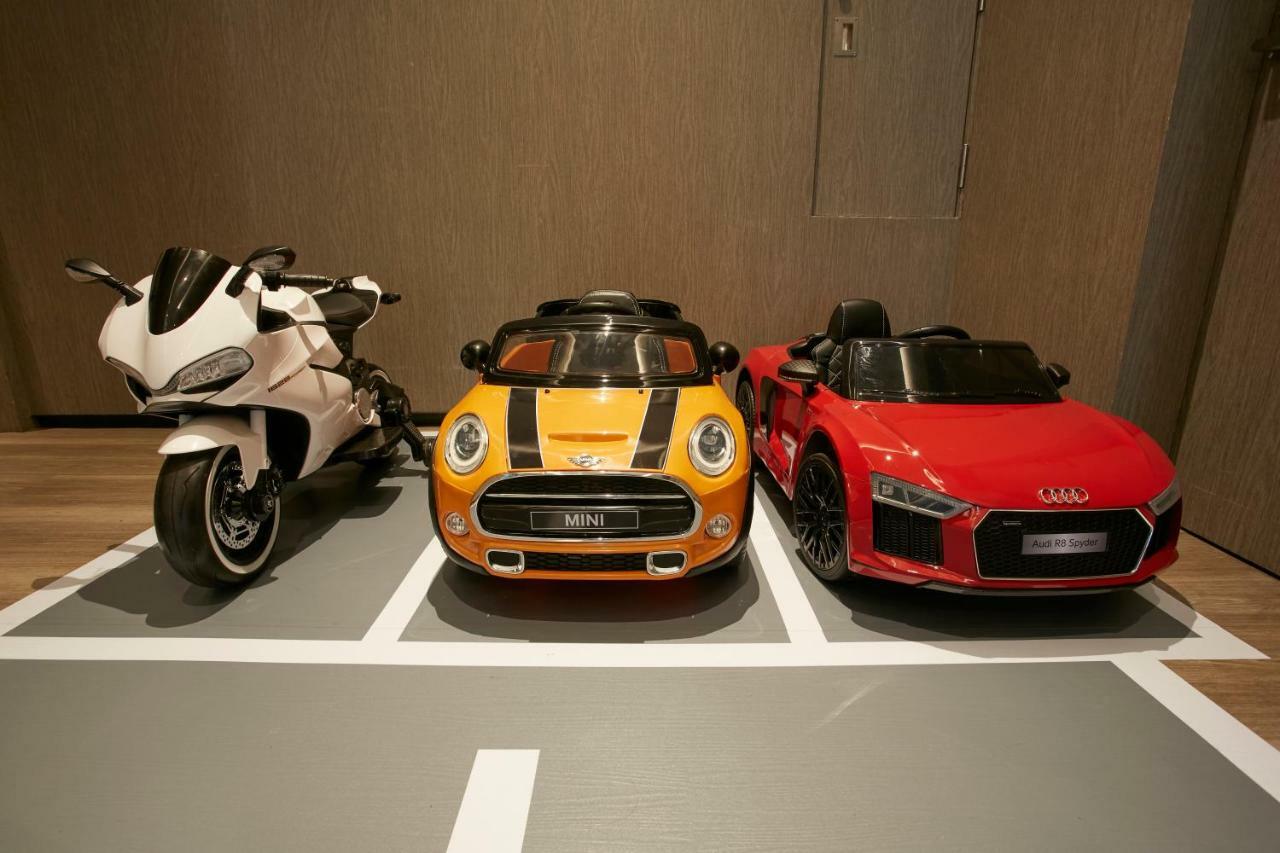 Mu Jiaoxi Hotel מראה חיצוני תמונה Children's electric cars and motorcycle